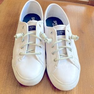 Sperry Top-Sider with no tie leather shoelaces . Gently used.
